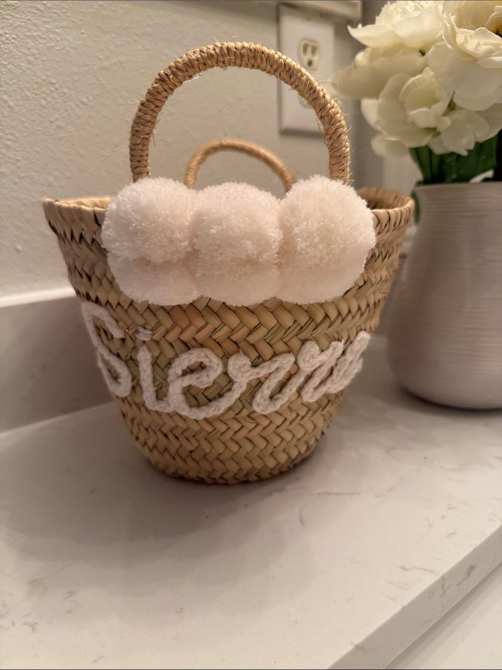 Amazon Straw Mini Basket Bag with Cream Pom Poms